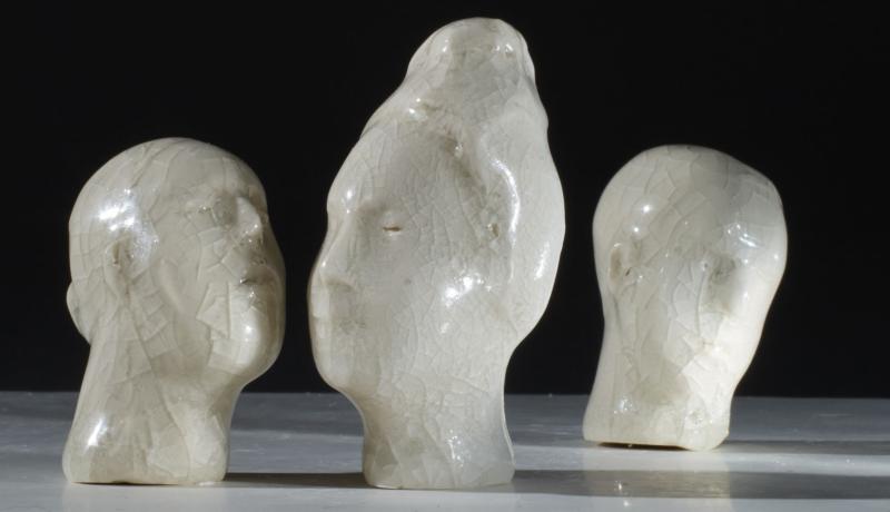 3 face sculptures of "Intimation of Memory".
