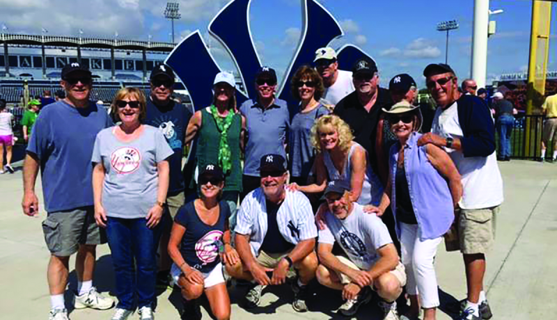 NJCU alumni pose at Yankee Stadium.
