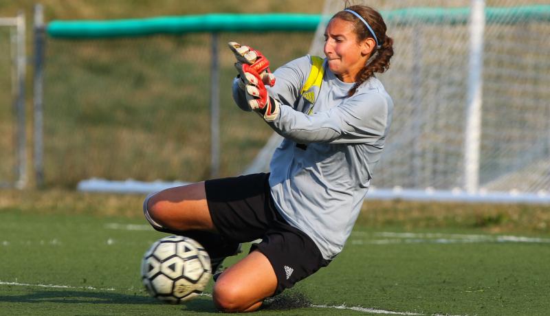 Cassie Lubonski of the women’s soccer team blocks soccer goal