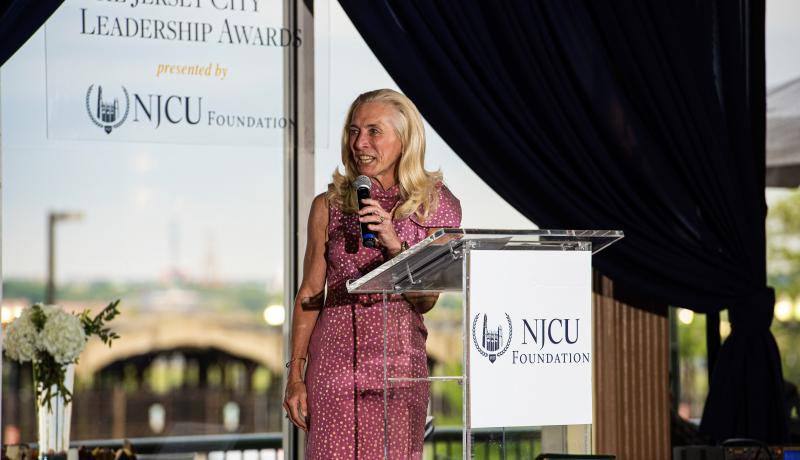 President Sue Henderson welcomes guest to the 2019 JCLA Awards