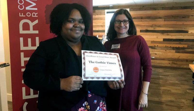 Editor-in-Chief Kenise Brown and adviser Theta Pavis-Weil with award