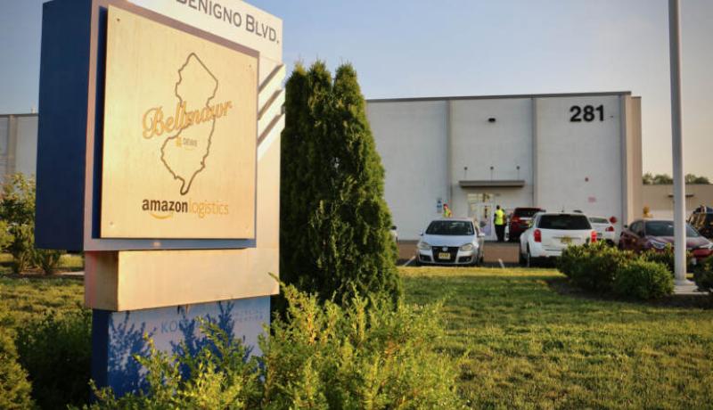 2022-06-01-e-lee-bellmawr-nj-amazon-dew8-workers-walk-out-over-planned-closure-sign-768x512
