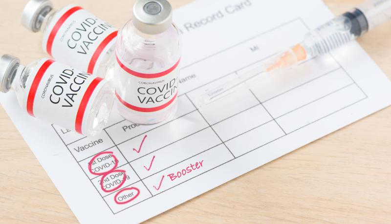 Booster dose of covid-19 vaccine - stock photo GettyImages-13434899