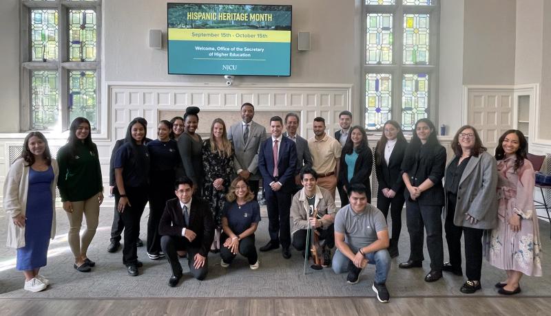 Dr. Brian Bridges and President Acebo with Student Roundtable