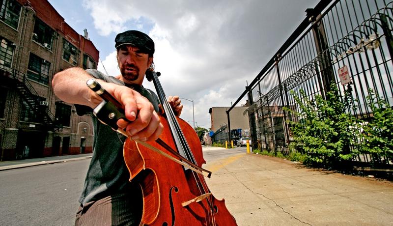 Dave Eggar playing the cello