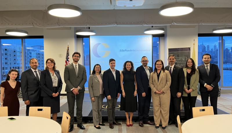 Event attendees pose for a photo