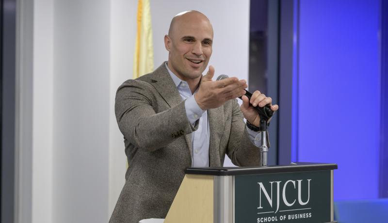 Adam San Miguel speaking in February 2026 at the Freedom Tower event.