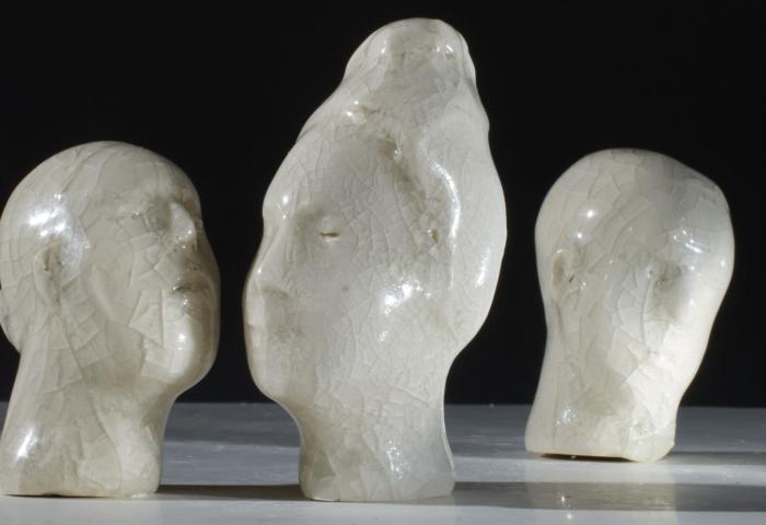 3 face sculptures of "Intimation of Memory".