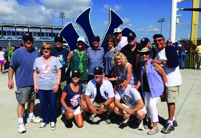 NJCU alumni pose at Yankee Stadium.