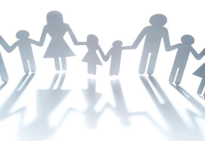 Paper doll adults and children holding hands