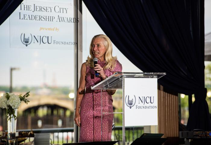 President Sue Henderson welcomes guest to the 2019 JCLA Awards