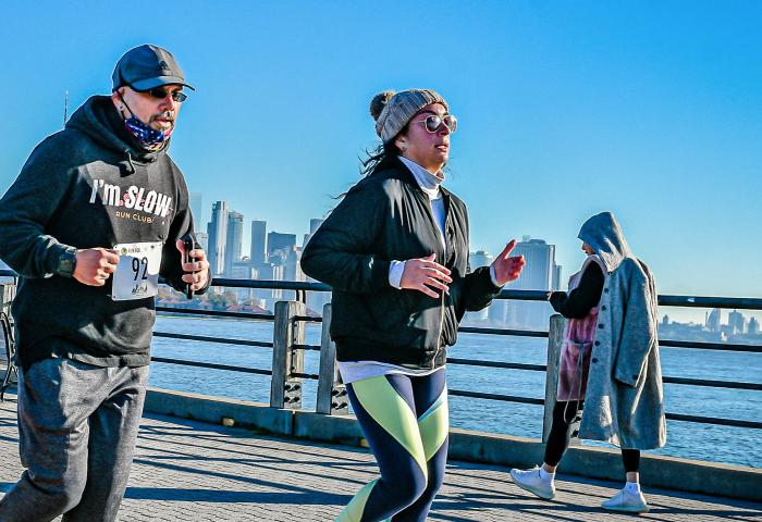 Roberto Romero running in Liberty State Park.