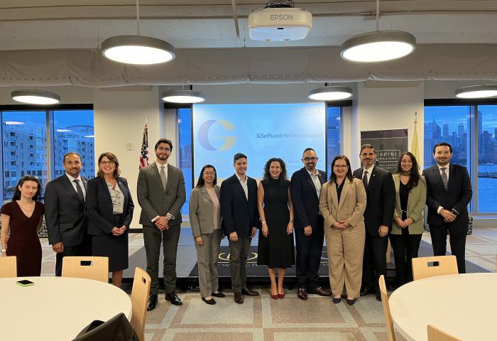 Event attendees pose for a photo