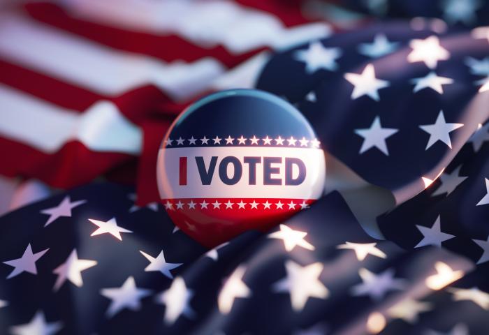 I Voted Printed Badge On Over American Flag