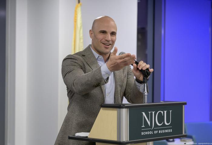 Adam San Miguel speaking in February 2026 at the Freedom Tower event.