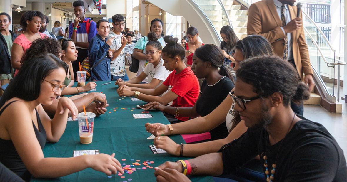 students playing bingo at a long table