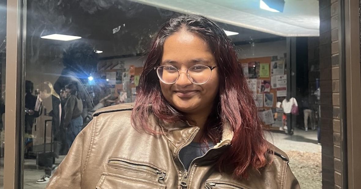 Sam Jaipersaud poses with her award