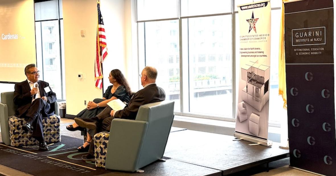 guarini institute event, 3 people seated