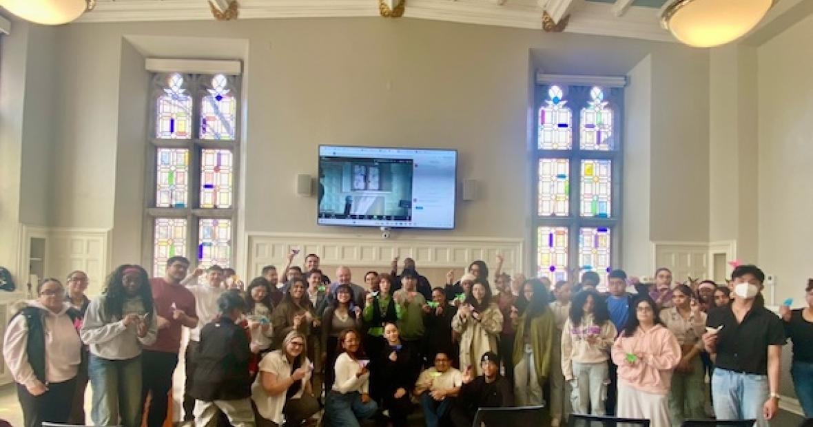 large group of attendees pose