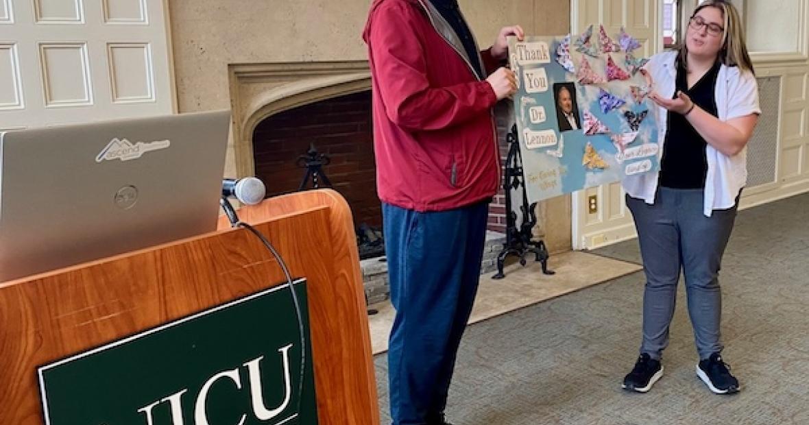 students present poster