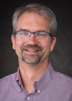 Reed Carroll headshot