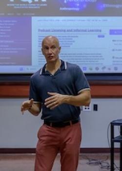 professor shamburg standing in classroom