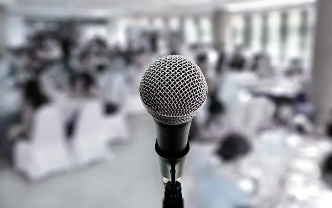 standing microphone in group gathering space