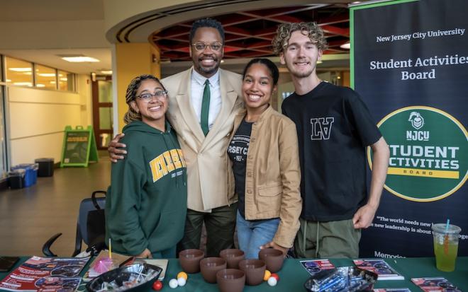 four people at sga table