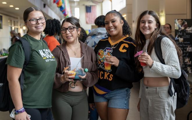 female students pose with mocktails