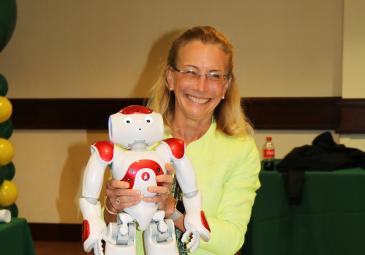 president with ed tech robot