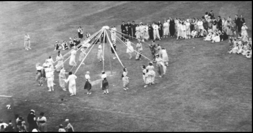 May Day festival featuring a Maypole dance.