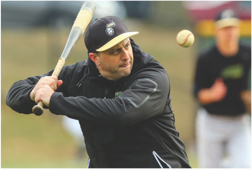 Member of NJCU baseball team about to swing.