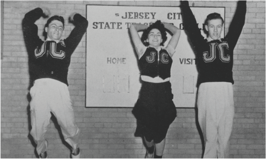 Jersey City University students jumping.