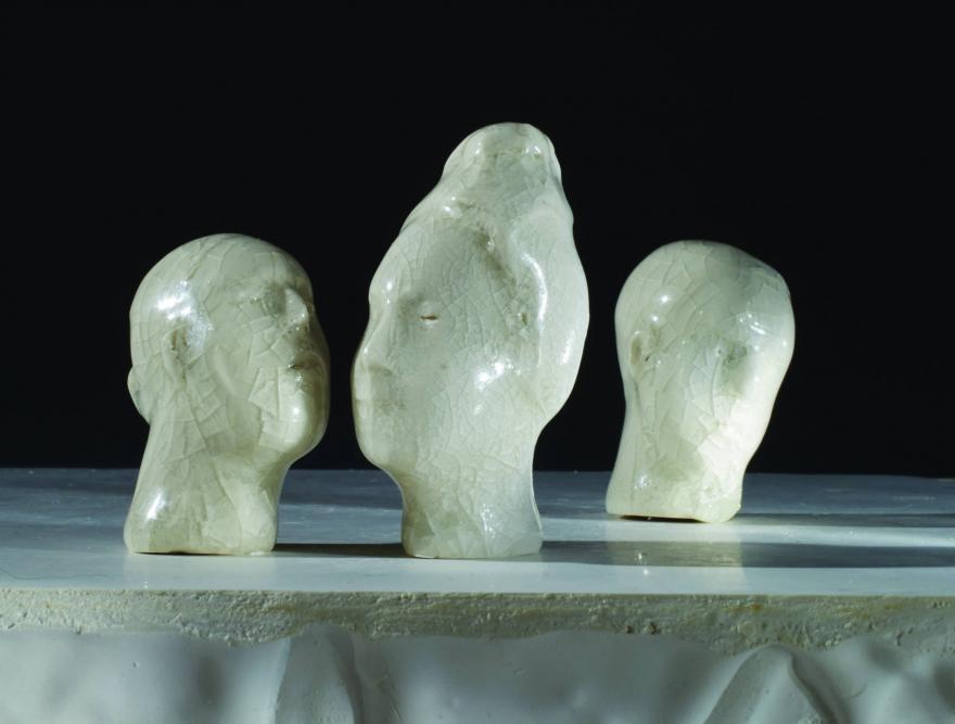 3 face sculptures of "Intimation of Memory".
