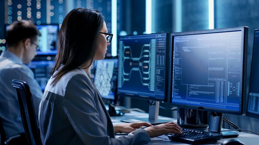 woman working in cyber security lab