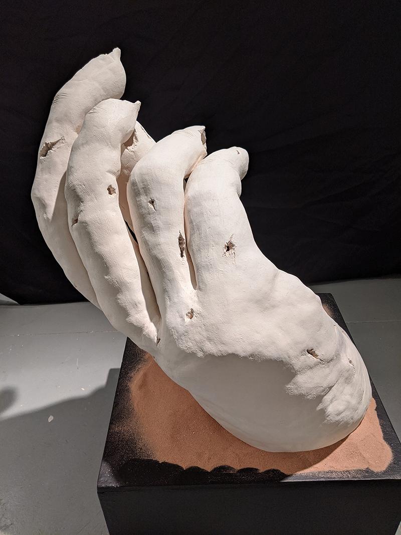 Clay sculpture for Pices Exhibit of a hand