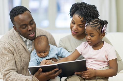Parents reading with their children