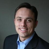 CARLOS LEJNIEKS HEADSHOT