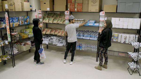 Three students in food pantry