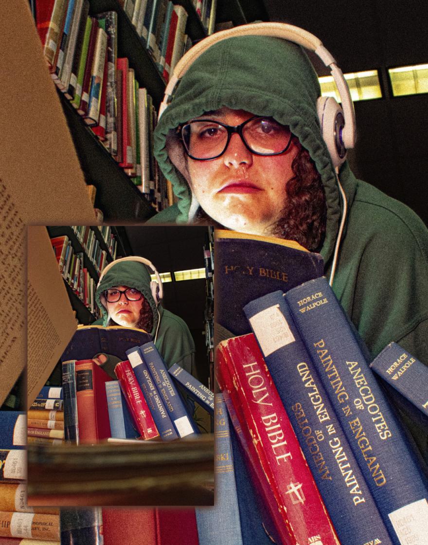 a girl frowning in front of a bible