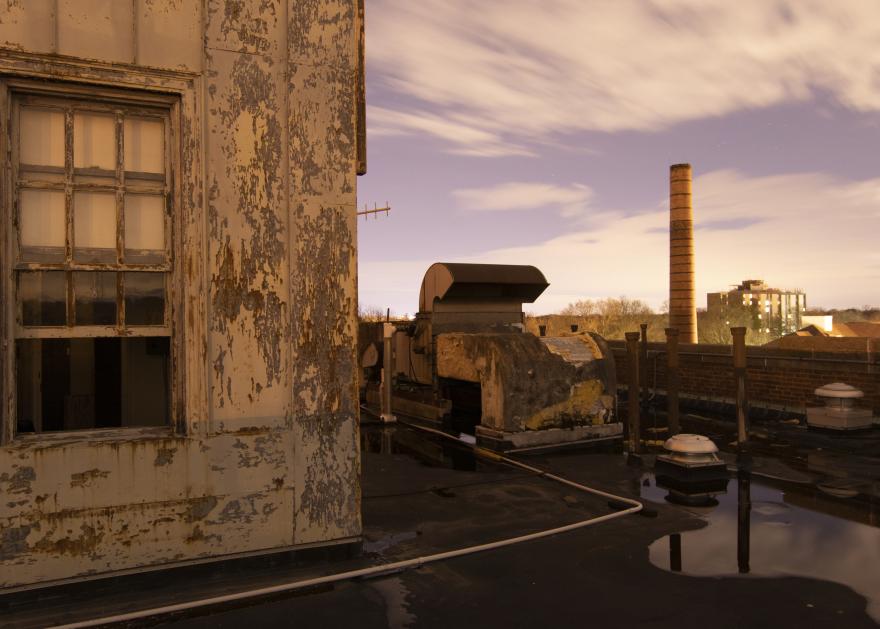 Photograph of old buildings at sunset