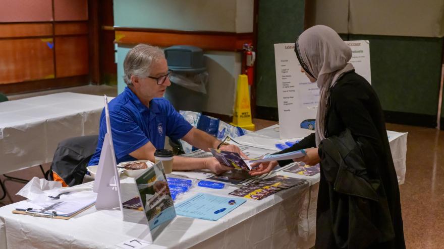 Student gets career information Trades Job Fair-4572