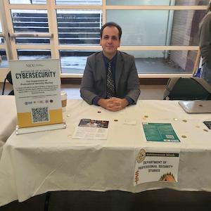 man seated at table in gsub