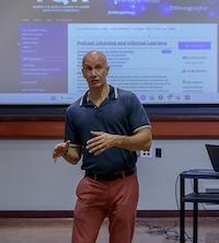 professor shamburg standing in classroom