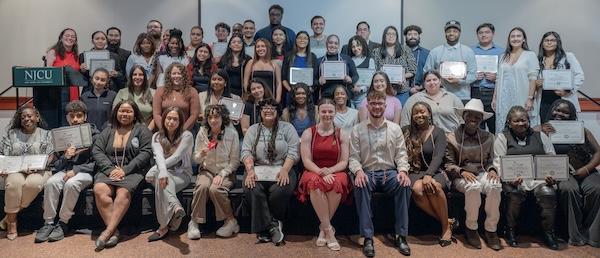 TLC STUDENTS SEATED WITH CERTIFICATES