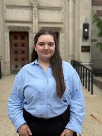 Reina Hoxhaj standing at hepburn hall
