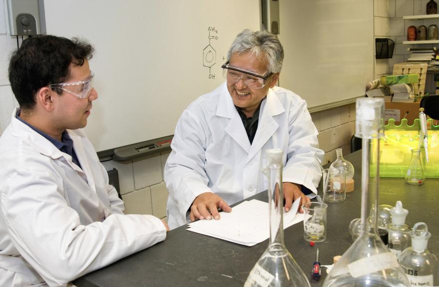 Dr. Kenneth S. Yamaguchi, a longtime professor in the Chemistry and Biochemistry Department at New Jersey City University, works on research with a student.