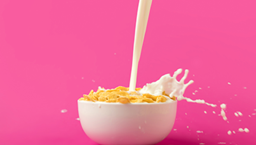 Cereal bowl with milk poruing into it