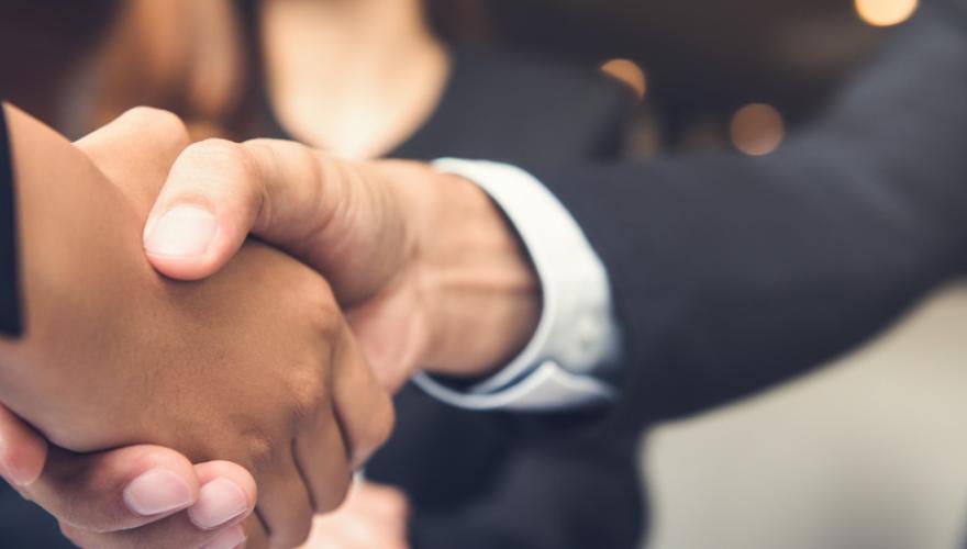 Shaking Hands Business Suit