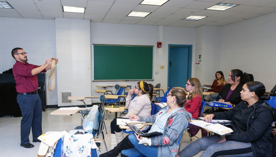 Teacher teaching a classroom